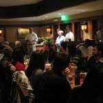 The Grill's Kyle Bergman, left, alongside the illuminated Colby Chandler of Ballast Point, with Matt Wilson of Ballast Point, right.