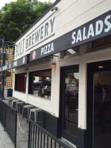 The outdoor seating area at Bolt Brewery's Little Italy tasting room